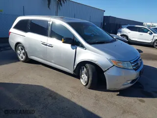 2011 Honda Odyssey Touring with VIN 5FNRL5H9XBB012899, listed as a IAAI auction lot 41611879 with 171,041 mi miles. Bid and sale history available at carsss.com. Image 1.