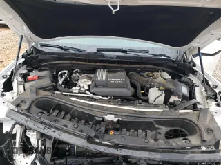 2021 Chevrolet Suburban with VIN 1GNSCCKT6MR473628, listed as a Copart auction lot 87695725 with 57,110 mi miles and Salvage title. Bid and sale history available at DreamBid. Image 12.