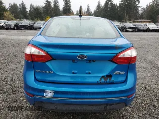 2016 Ford Fiesta Titanium z VIN 3FADP4CJ3GM108313, wystawiony jako Copart lot #78457954 z przebiegiem 44 726 mil mil oraz Szkoda całkowita • Salvage title. Historia ofert i sprzedaży dostępna na DreamBid. Obrazek 6.
