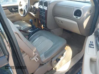 2004 GMC Envoy SLE z VIN 1GKDT13SX42416096, wystawiony jako IAAI lot #41695510 z przebiegiem 240 658 mil mil oraz . Historia ofert i sprzedaży dostępna na DreamBid. Obrazek 5.