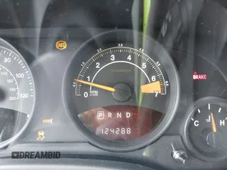 2015 Jeep Patriot Sport with VIN 1C4NJRBB1FD121420, listed as a IAAI auction lot 42344487 with 124,288 mi miles and . Bid and sale history available at DreamBid. Image 16.