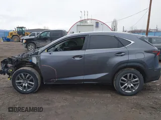 2016 Lexus NX 200t with VIN JTJBARBZ5G2052600, listed as a IAAI auction lot 41813813 with 154,423 mi miles and . Bid and sale history available at DreamBid. Image 15.