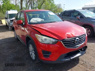2016 Mazda CX-5 Sport with VIN JM3KE4BY9G0711654, listed as a IAAI auction lot 42149073 with 110,672 mi miles and . Bid and sale history available at DreamBid. Image 1.