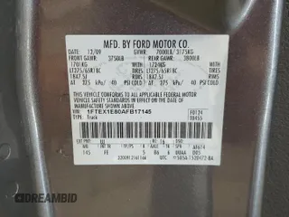 2010 Ford F-150 XL z VIN 1FTEX1E80AFB17145, wystawiony jako Copart lot #56882925 z przebiegiem 101 685 mil mil oraz Nie do naprawy • Non repairable. Historia ofert i sprzedaży dostępna na DreamBid. Obrazek 12.