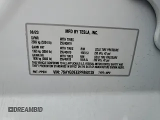 2023 Tesla Model Y Long Range with VIN 7SAYGDEE2PF860135, listed as a Copart auction lot 50380975 with 25,334 mi miles and Salvage Title. Bid and sale history available at DreamBid. Image 12.
