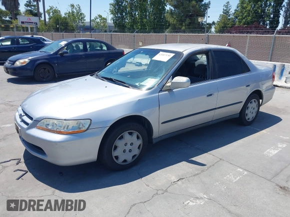 1999 Honda Accord LX with VIN JHMCG665XXC033464, listed as a IAAI auction lot 42687150 with 194,076 mi miles and . Bid and sale history available at DreamBid. Image 2.