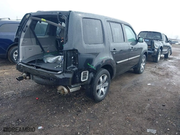 2012 Honda Pilot Touring with VIN 5FNYF4H94CB011228, listed as a IAAI auction lot 41808492 with 231,047 mi miles. Bid and sale history available at carsss.com. Image 4.