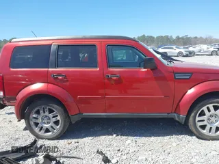 2010 Dodge Nitro SE with VIN 1D4PT2GK7AW142856, listed as a IAAI auction lot 41855687 with 197,248 mi miles. Bid and sale history available at carsss.com. Image 14.