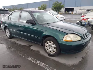 1999 Honda Civic VP with VIN 2HGEJ6618XH579736, listed as a IAAI auction lot 41912296 with 268,631 mi miles. Bid and sale history available at carsss.com. Image 1.