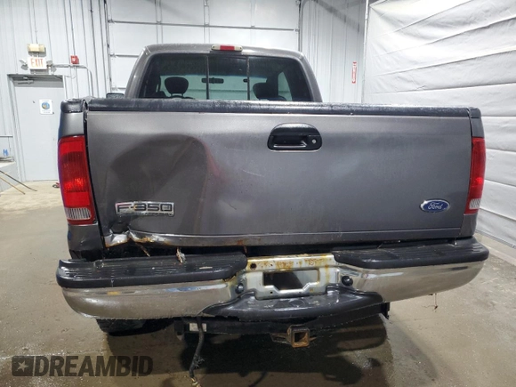 2005 Ford F-350 XL with VIN 1FTWX31P35EB41027, listed as a Copart auction lot 57124585 with 304,957 mi miles and Salvage title. Bid and sale history available at DreamBid. Image 6.