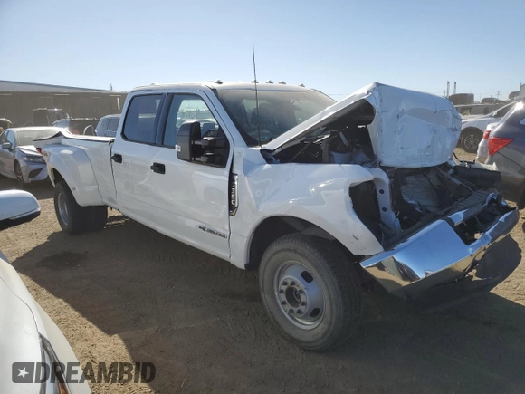 2022 Ford F-350 XL with VIN 1FT8W3DTXNEF29974, listed as a Copart auction lot 48069965 with 26,911 mi miles and Salvage Title. Bid and sale history available at DreamBid. Image 4.