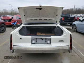 1990 Cadillac Fleetwood z VIN 1G6CB5332L4248633, wystawiony jako Copart lot #44218444 z przebiegiem 40 635 mil mil oraz Nie do naprawy. Historia ofert i sprzedaży dostępna na DreamBid. Obrazek 6.