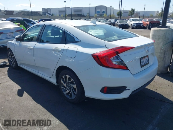 2018 Honda Civic EX with VIN 2HGFC2F71JH502564, listed as a IAAI auction lot 41933157 with 56,696 mi miles and . Bid and sale history available at DreamBid. Image 3.