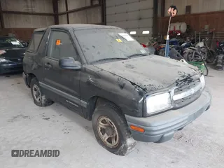 1999 Chevrolet Tracker z VIN 2CNBE18CXX6919189, wystawiony jako IAAI lot #42196856 z przebiegiem Nie podano mil oraz . Historia ofert i sprzedaży dostępna na DreamBid. Obrazek 1.