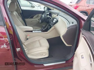 2015 Buick LaCrosse Premium I with VIN 1G4GD5G36FF174740, listed as a IAAI auction lot 42133414 with 121,408 mi miles and . Bid and sale history available at DreamBid. Image 5.