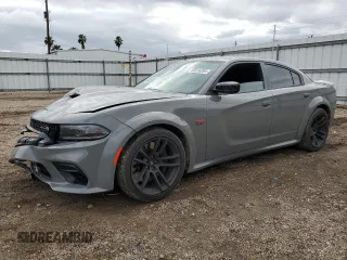 2023 Dodge Charger Scat Pack Widebody with VIN 2C3CDXGJ0PH697902, listed as a Copart auction lot 85016204 with 9,056 mi miles and Salvage Title. Bid and sale history available at carsss.com. Image 1.