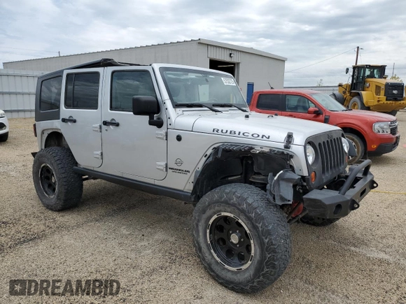 2011 Jeep Wrangler Unlimited Rubicon with VIN 1J4BA6H13BL537964, listed as a Copart auction lot 57532725 with 71,498 mi miles and Salvage title. Bid and sale history available at DreamBid. Image 4.