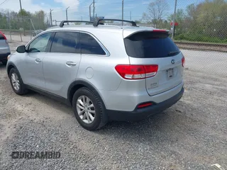 2016 Kia Sorento LX with VIN 5XYPG4A35GG048897, listed as a IAAI auction lot 41986578 with 161,157 mi miles. Bid and sale history available at carsss.com. Image 3.