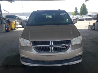 2014 Dodge Grand Caravan SXT with VIN 2C4RDGCG6ER427418, listed as a Copart auction lot 55841215 with 154,524 mi miles and Clean Title. Bid and sale history available at DreamBid. Image 5.