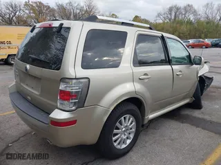 2011 Mercury Mariner Premier with VIN 4M2CN8H78BKJ01173, listed as a IAAI auction lot 40734817 with 67,784 mi miles. Bid and sale history available at carsss.com. Image 4.