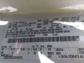 2014 Ford Econoline Cargo Commercial with VIN 1FTNE2EW3EDA18900, listed as a IAAI auction lot 41209002 with 138,014 mi miles. Bid and sale history available at carsss.com. Image 9.