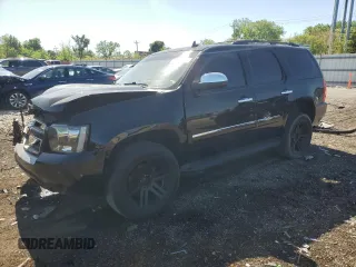 2012 Chevrolet Tahoe LTZ with VIN 1GNSKCE07CR117885, listed as a Copart auction lot 57122985 with 372,227 mi miles and Salvage title. Bid and sale history available at DreamBid. Image 1.