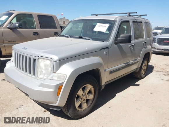 2012 Jeep Liberty Sport with VIN 1C4PJMAK1CW106039, listed as a IAAI auction lot 41810966 with 120,121 mi miles. Bid and sale history available at carsss.com. Image 2.