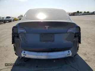 2024 Tesla Model Y Long Range с VIN 7SAYGDEE8RF184146, выставлен на аукционе Copart как лот 61194535 с пробегом 8 225 миль миль и Списание • Salvage title. История ставок и продаж доступна на DreamBid. Изображение 6.