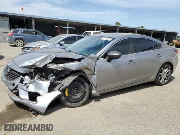 2014 Mazda 6 i Sport with VIN JM1GJ1U6XE1159917, listed as a Copart auction lot 52995325 with 97,652 mi miles and Salvage Title. Bid and sale history available at DreamBid. Image 1.