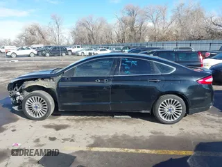2016 Ford Fusion Titanium with VIN 3FA6P0K9XGR152837, listed as a IAAI auction lot 41647436 with 196,700 mi miles. Bid and sale history available at carsss.com. Image 14.
