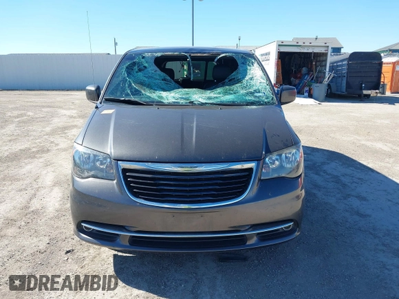 2016 Chrysler Town & Country S with VIN 2C4RC1HG9GR128212, listed as a IAAI auction lot 40858279 with 169,433 mi miles. Bid and sale history available at carsss.com. Image 12.