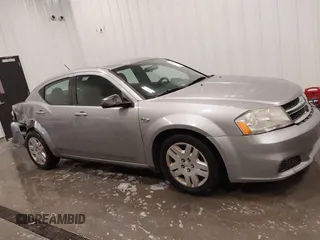 2014 Dodge Avenger SE with VIN 1C3CDZAB4EN148429, listed as a IAAI auction lot 41687320 with 149,084 mi miles and . Bid and sale history available at DreamBid. Image 14.