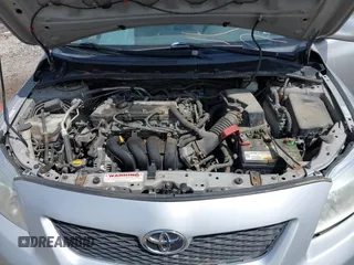 2009 Toyota Corolla with VIN 1NXBU40E49Z017630, listed as a IAAI auction lot 42204714 with 176,828 mi miles. Bid and sale history available at carsss.com. Image 10.