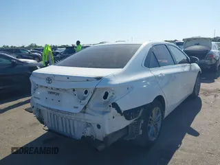 2015 Toyota Camry XLE with VIN 4T1BF1FK2FU001539, listed as a IAAI auction lot 41958674 with 163,758 mi miles and . Bid and sale history available at DreamBid. Image 4.