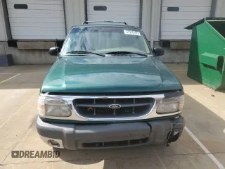 2000 Ford Explorer XLT с VIN 1FMZU73E2YZB13205, выставлен на аукционе Copart как лот 57918165 с пробегом 203 635 миль миль и Чистый • Clean title. История ставок и продаж доступна на DreamBid. Изображение 5.