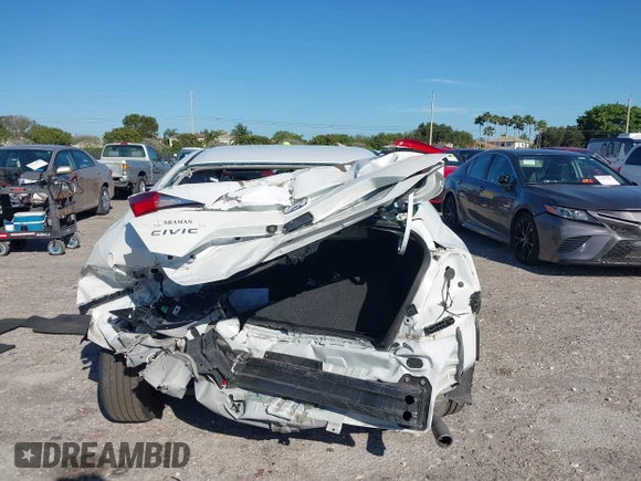 2020 Honda Civic LX z VIN 19XFC2F68LE206395, wystawiony jako IAAI lot #41720356 z przebiegiem 38 037 mil mil oraz . Historia ofert i sprzedaży dostępna na DreamBid. Obrazek 17.