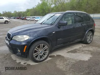 2012 BMW X5 35i z VIN 5UXZV4C5XCL748652, wystawiony jako Copart lot #55457455 z przebiegiem 149 030 mil mil oraz Szkoda całkowita • Salvage title. Historia ofert i sprzedaży dostępna na DreamBid. Obrazek 1.