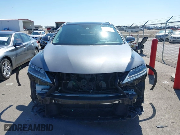 2020 Lexus RX 450h with VIN 2T2JGMDA2LC053394, listed as a IAAI auction lot 41979007 with 56,331 mi miles and . Bid and sale history available at DreamBid. Image 13.