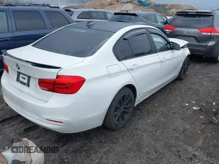 2018 BMW 3 Series 320i xDrive with VIN WBA8E5G52JNU46803, listed as a IAAI auction lot 41869625 with 67,057 mi miles. Bid and sale history available at carsss.com. Image 4.