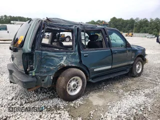 1998 Ford Explorer XLT with VIN 1FMZU32P8WZA91509, listed as a Copart auction lot 65531174 with 127,182 mi miles and Salvage title. Bid and sale history available at DreamBid. Image 3.
