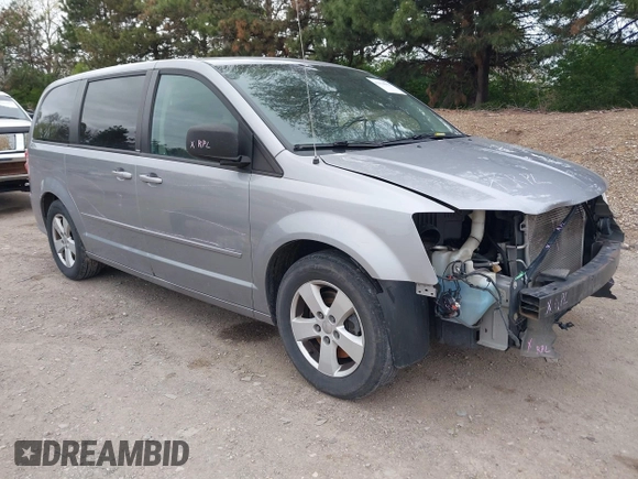 2014 Dodge Grand Caravan American Value with VIN 2C4RDGBG0ER168085, listed as a IAAI auction lot 42020959 with 213,383 mi miles and . Bid and sale history available at DreamBid. Image 1.