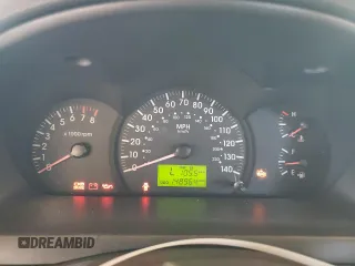 2006 Kia Spectra EX with VIN KNAFE121465332510, listed as a Copart auction lot 77211974 with 148,964 mi miles and Salvage Title. Bid and sale history available at carsss.com. Image 9.