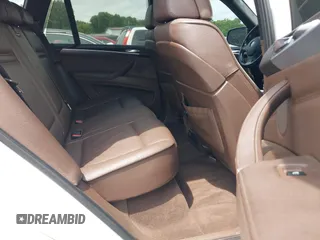 2012 BMW X5 35i z VIN 5UXZV4C55CL754164, wystawiony jako IAAI lot #42131605 z przebiegiem 147 177 mil mil oraz . Historia ofert i sprzedaży dostępna na DreamBid. Obrazek 8.