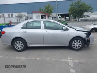 2009 Toyota Corolla with VIN 1NXBU40E29Z162410, listed as a IAAI auction lot 41905756 with 104,866 mi miles. Bid and sale history available at carsss.com. Image 12.