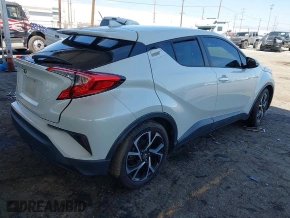 2018 Toyota C-HR XLE with VIN NMTKHMBX9JR022921, listed as a IAAI auction lot 41858651 with 50,448 mi miles. Bid and sale history available at carsss.com. Image 4.