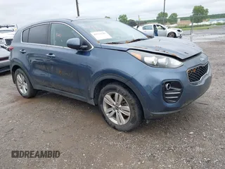 2018 Kia Sportage LX z VIN KNDPMCAC1J7397420, wystawiony jako IAAI lot #42231141 z przebiegiem 86 214 mil mil oraz . Historia ofert i sprzedaży dostępna na DreamBid. Obrazek 1.