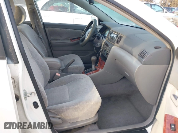 2004 Toyota Corolla CE with VIN JTDBR32E042025208, listed as a IAAI auction lot 41934485 with 299,999 mi miles. Bid and sale history available at carsss.com. Image 5.