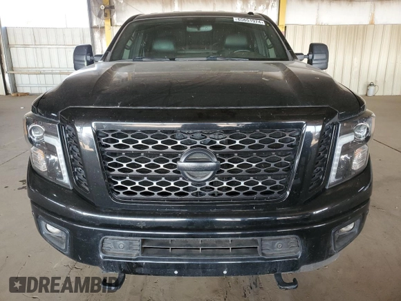 2019 Nissan Titan XD SL with VIN 1N6BA1F47KN534864, listed as a Copart auction lot 65651974 with 79,230 mi miles and Salvage Title. Bid and sale history available at carsss.com. Image 5.