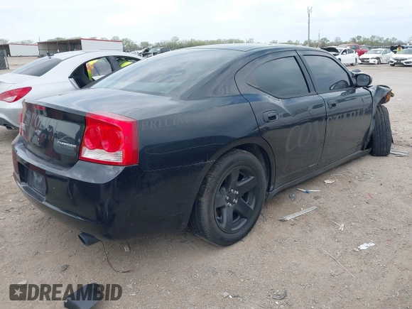 2009 Dodge Charger Police with VIN 2B3KA43T09H571873, listed as a IAAI auction lot 41842926 with 137,004 mi miles and . Bid and sale history available at carsss.com. Image 4.