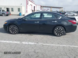 2018 Nissan Altima SR with VIN 1N4AL3AP7JC279459, listed as a IAAI auction lot 41901831 with 104,798 mi miles and . Bid and sale history available at DreamBid. Image 14.